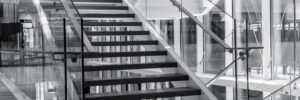 Indoors stairs in a modern architecture building. Black and white high contrast picture